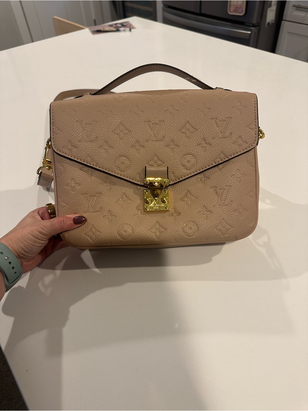 Faux Louis Vuitton Beige Embossed Top Handle Bag
